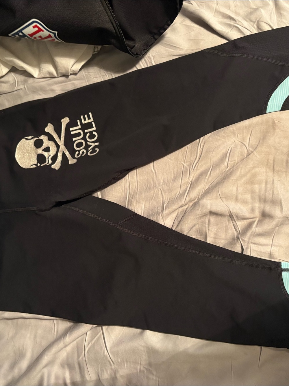 soulcycle Black Leggings with Skull Logo and Aqua Trim